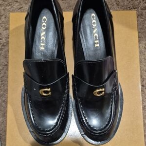 Coach Glossy Black Loafers with Gold Detail